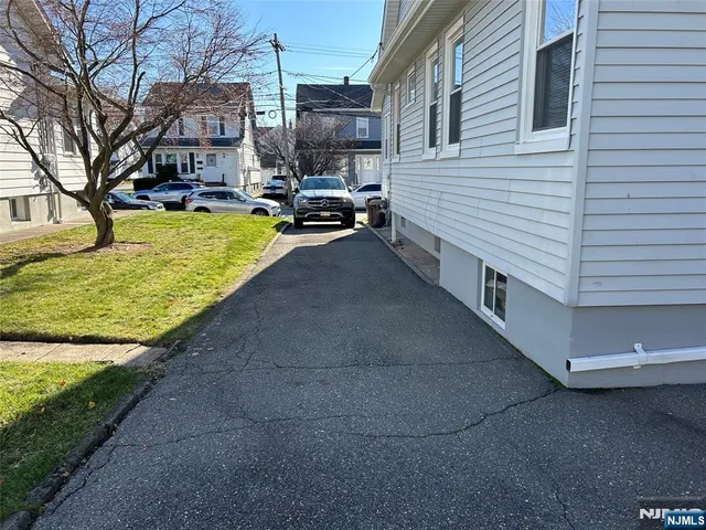 a view of a patio with a yard