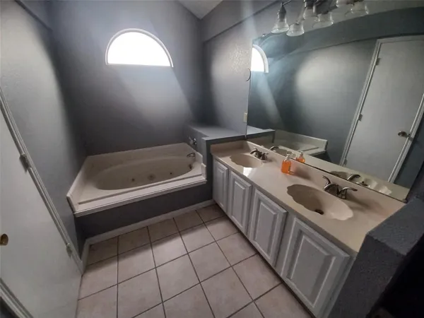 a bathroom with a sink and a bathtub