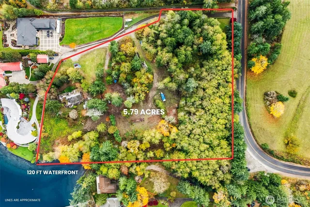 view of a swimming pool with a bench and mirror