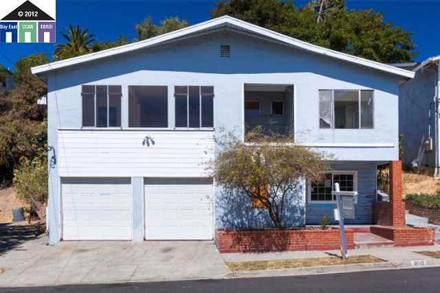 900 Mariposa Street Rodeo, CA 94572 - Photo 1 of 1 a front view of house with yard