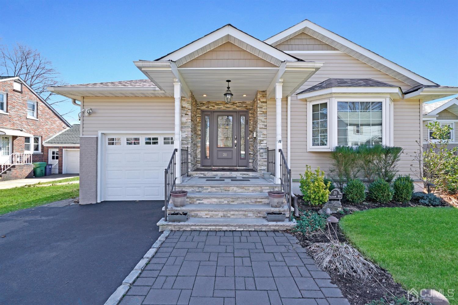 21 Palisade Road Linden, NJ 07036 - Photo 2 of 25 a front view of a house with a porch