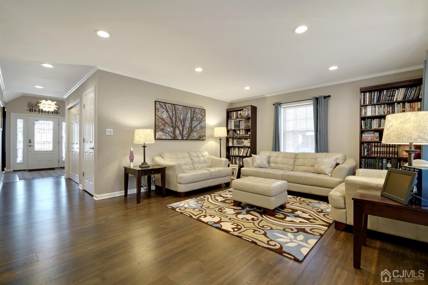 21 Palisade Road Linden, NJ 07036 - Photo 11 of 25 a living room with furniture and a table