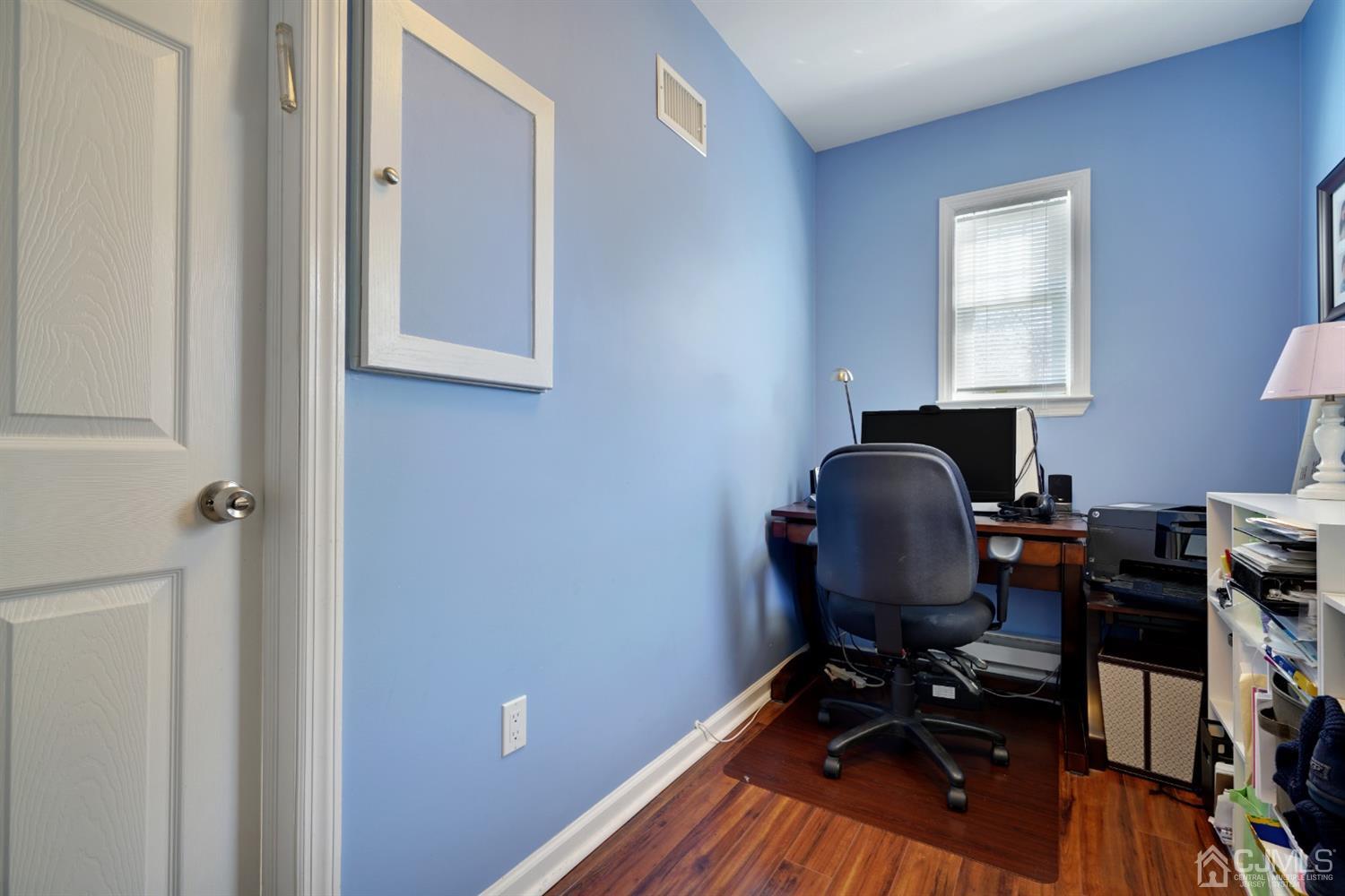 21 Palisade Road Linden, NJ 07036 - Photo 16 of 25 a view of a workspace with furniture and a window