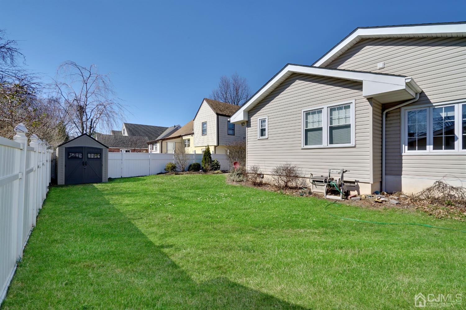 21 Palisade Road Linden, NJ 07036 - Photo 25 of 25 a front view of house with yard and green space