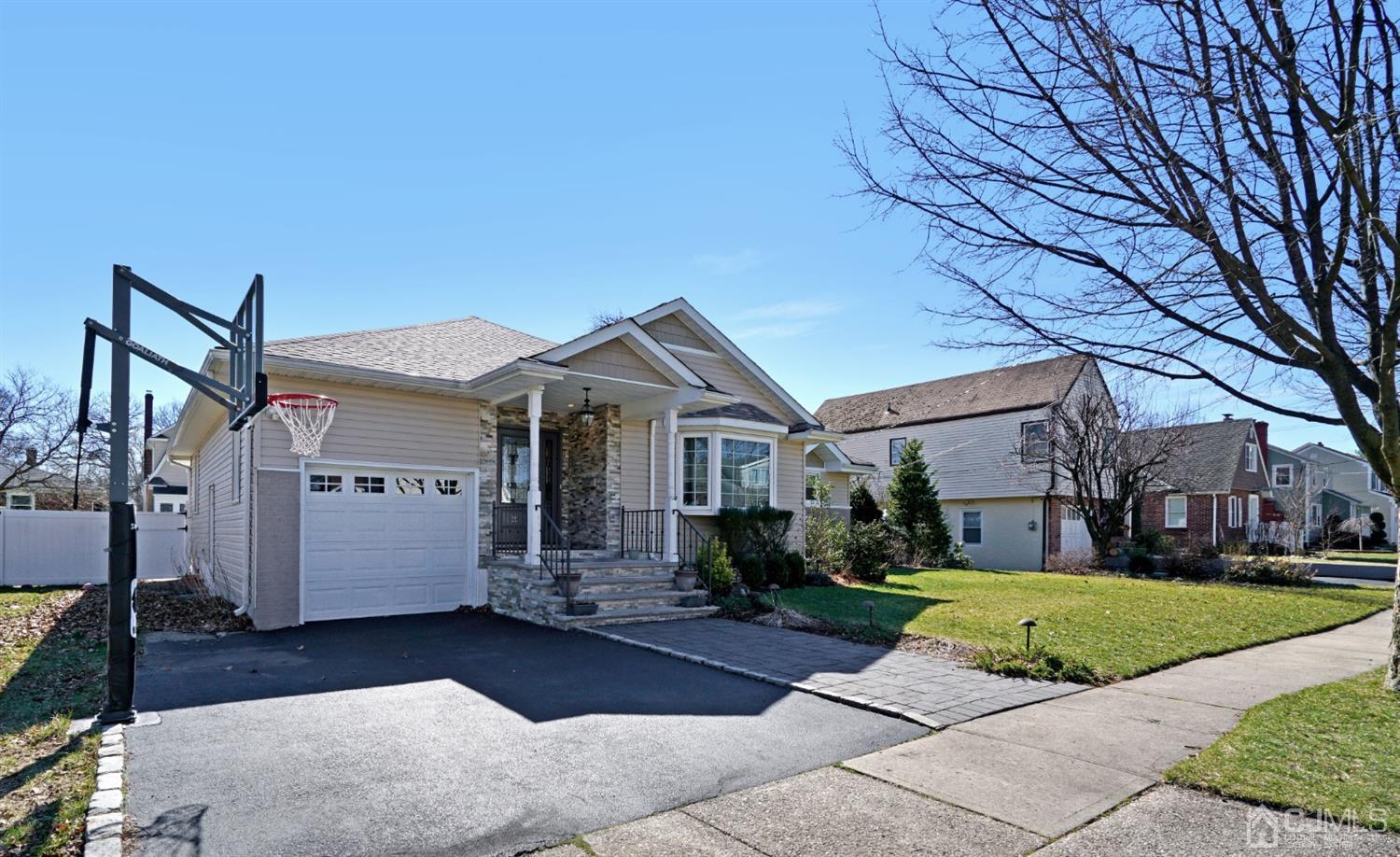 21 Palisade Road Linden, NJ 07036 - Photo 4 of 25 a front view of a house with a yard