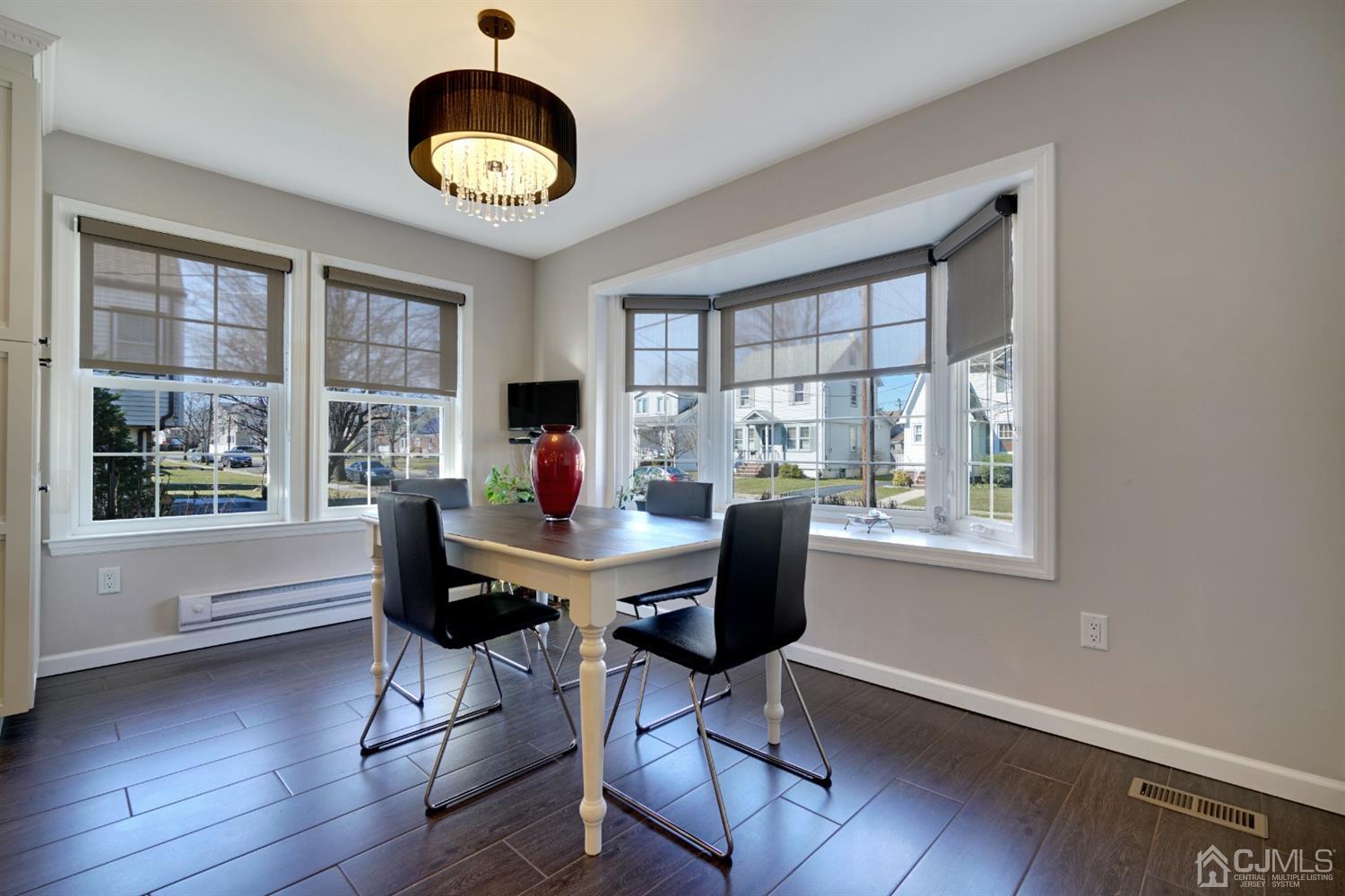 21 Palisade Road Linden, NJ 07036 - Photo 6 of 25 a view of a workspace with furniture and a window