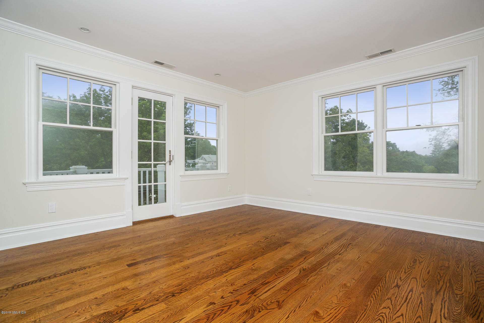 146 East Elm Street, Unit B Greenwich, CT 06830 - Photo 13 of 21 a view of an empty room with a window