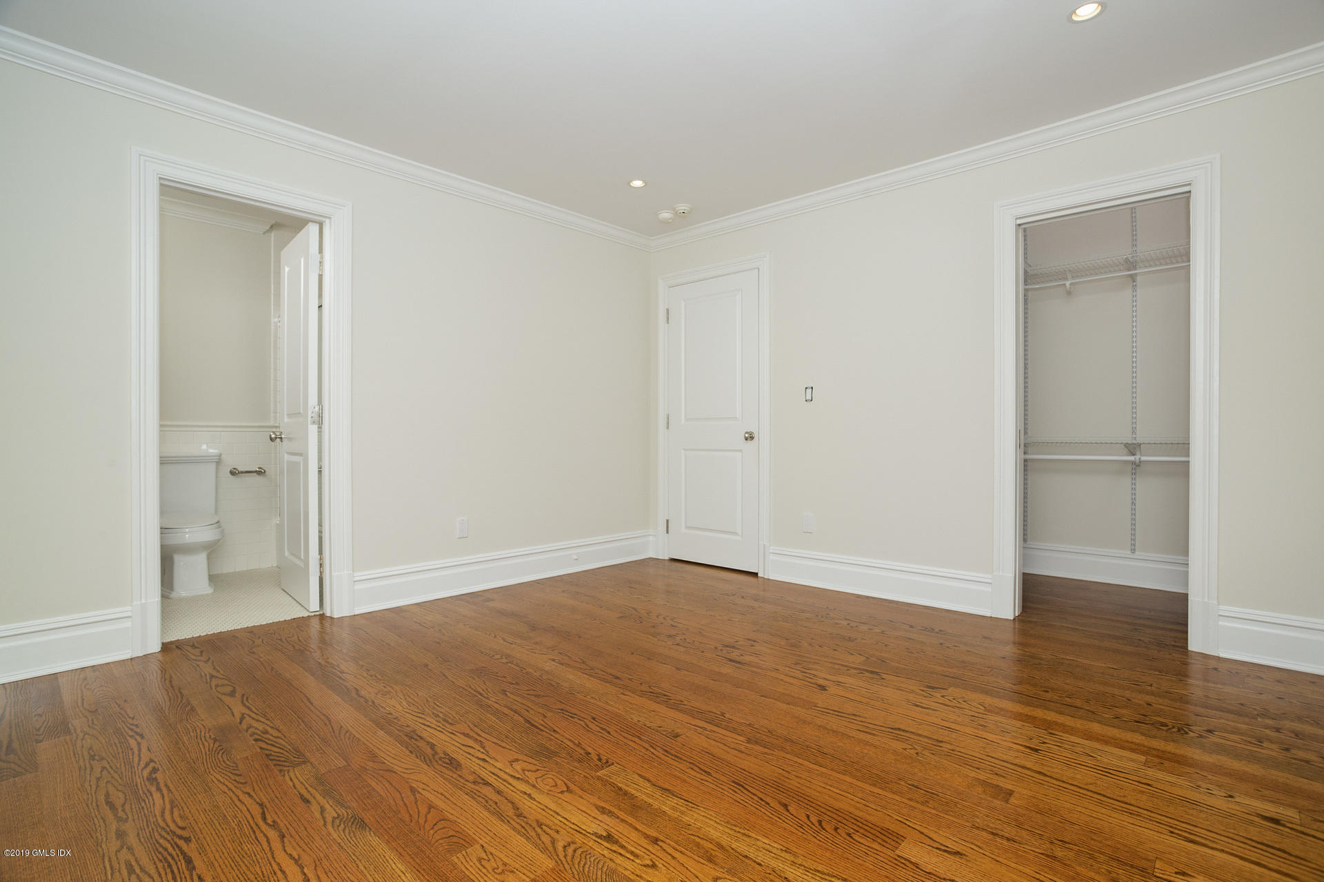 146 East Elm Street, Unit B Greenwich, CT 06830 - Photo 15 of 21 a view of empty room with wooden floor