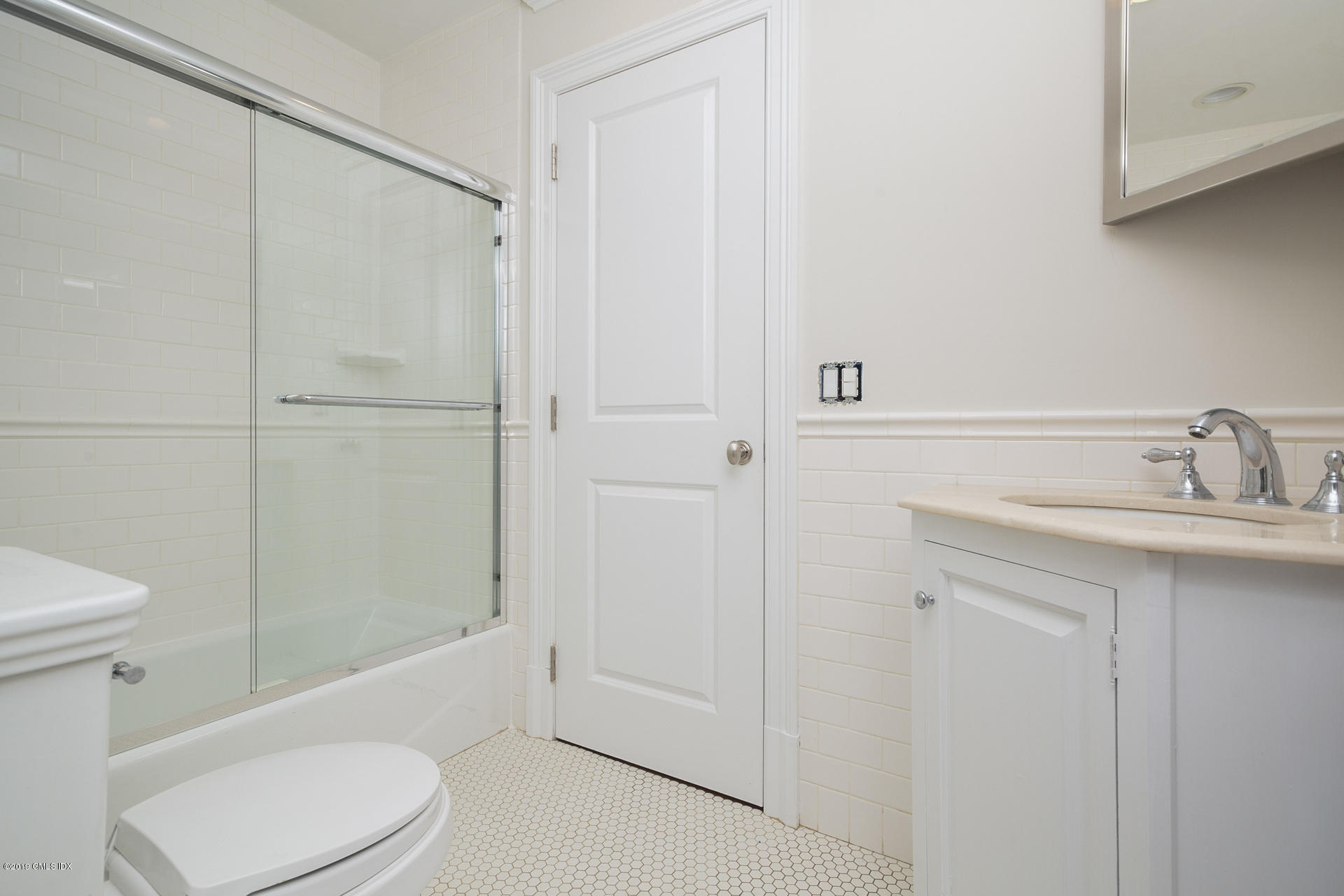146 East Elm Street, Unit B Greenwich, CT 06830 - Photo 10 of 21 a bathroom with a sink a toilet and shower