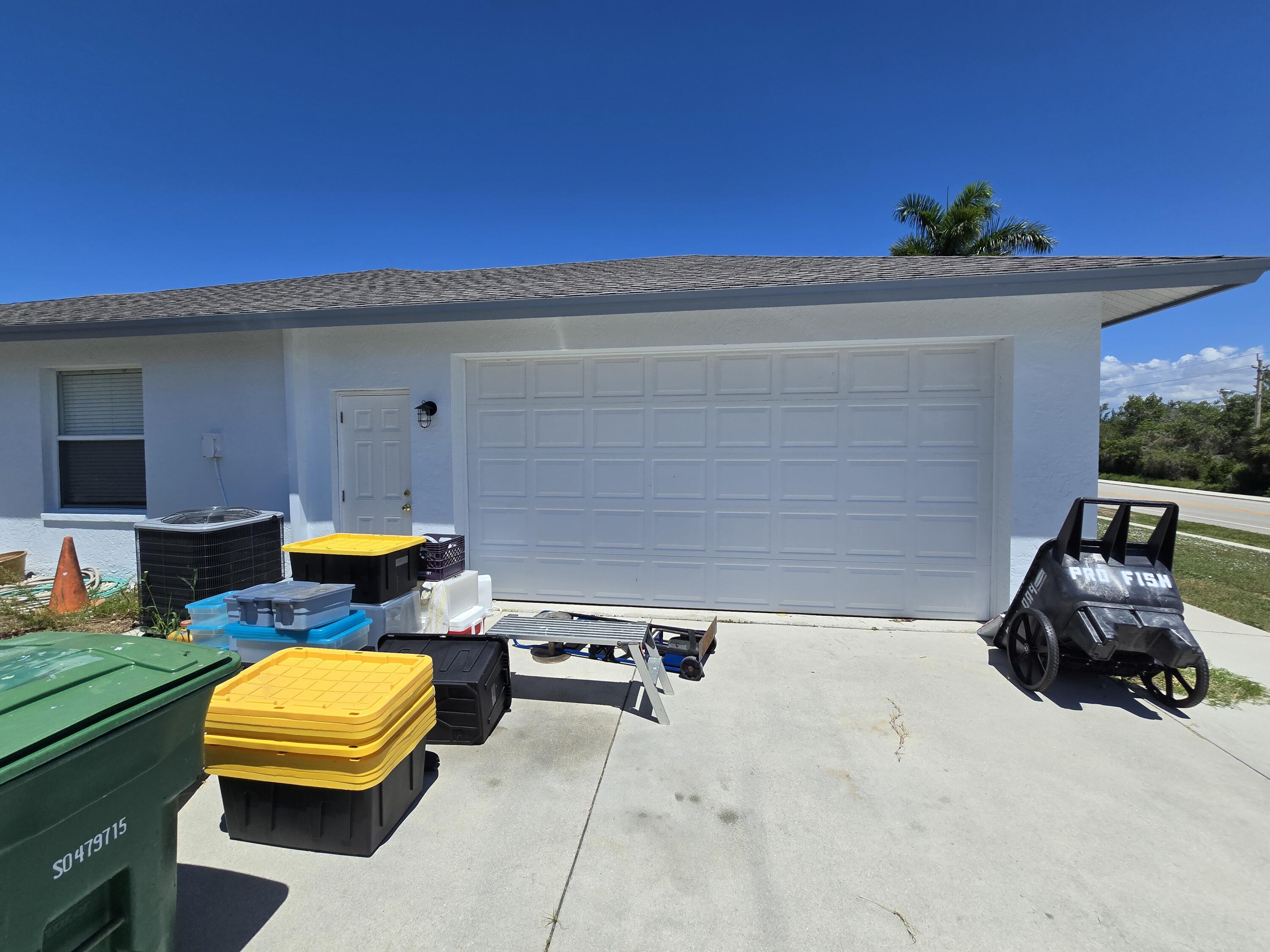 2049 San Marco Road Marco Island, FL 34145 - Photo 16 of 71 2 Car Side Load Garage!