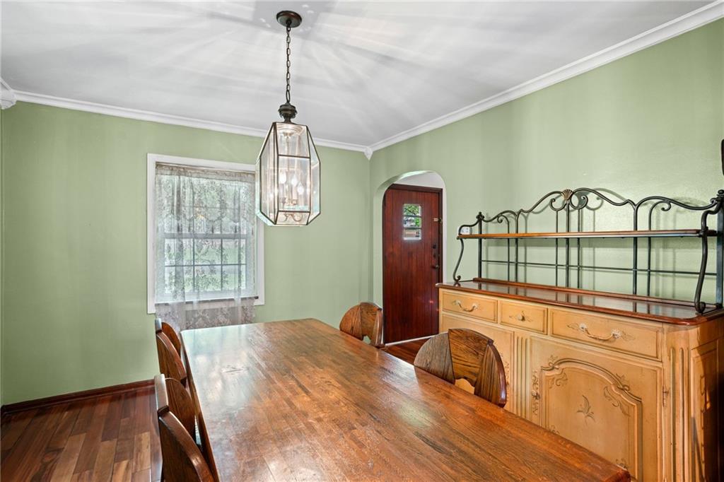 1445 Dutch Ridge Road Beaver, PA 15009 - Photo 15 of 43 a view of a bedroom with furniture window and wooden floor