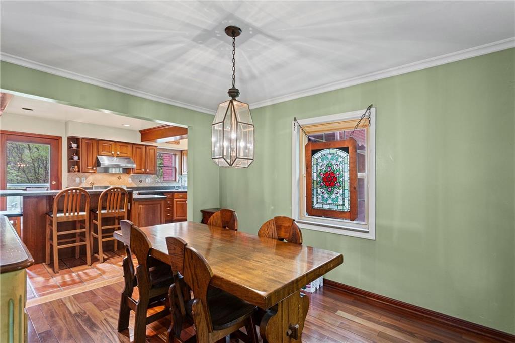 1445 Dutch Ridge Road Beaver, PA 15009 - Photo 16 of 43 a view of a dining room with furniture window and wooden floor
