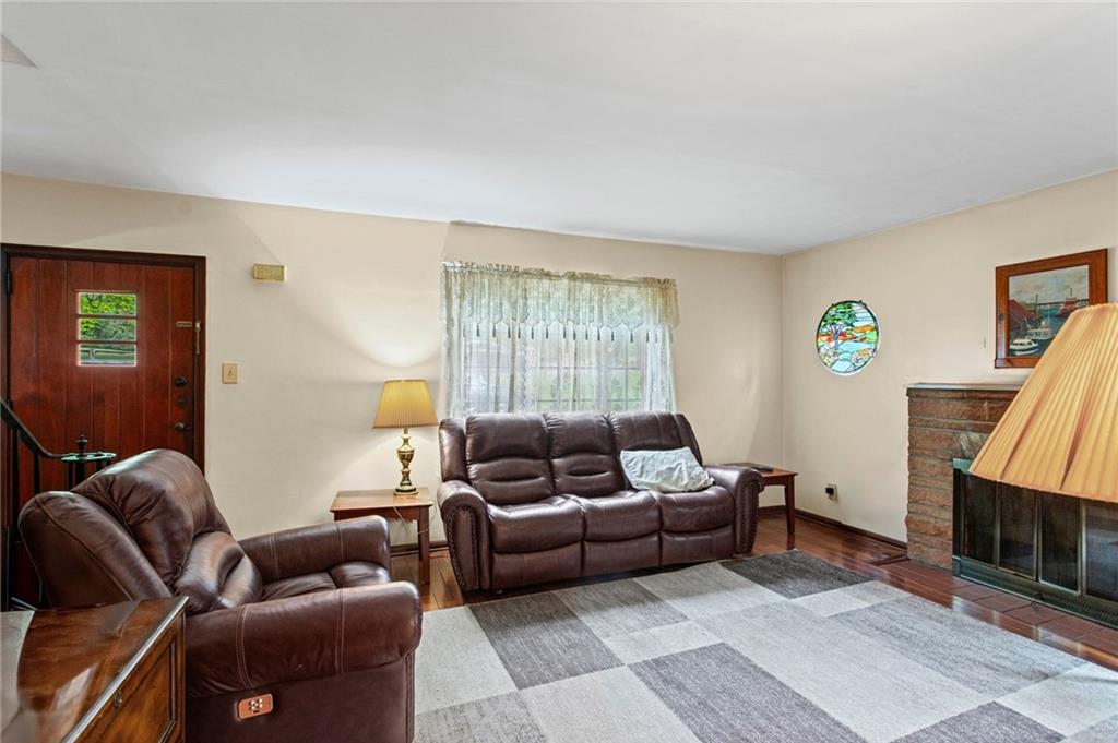 1445 Dutch Ridge Road Beaver, PA 15009 - Photo 18 of 43 a living room with furniture and a window