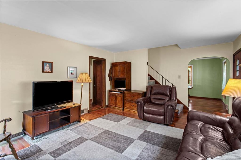 1445 Dutch Ridge Road Beaver, PA 15009 - Photo 20 of 43 a living room with furniture and a flat screen tv