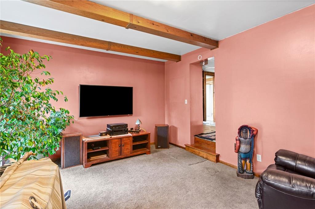 1445 Dutch Ridge Road Beaver, PA 15009 - Photo 34 of 43 a living room with furniture and a flat screen tv