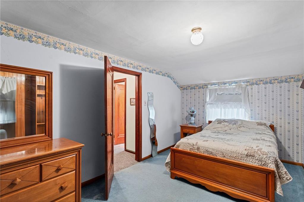 1445 Dutch Ridge Road Beaver, PA 15009 - Photo 39 of 43 a bedroom with a bed and a dresser