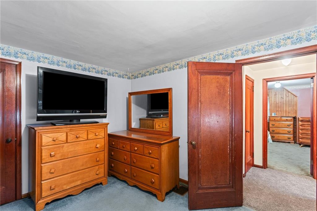 1445 Dutch Ridge Road Beaver, PA 15009 - Photo 40 of 43 a room with furniture and flat screen tv
