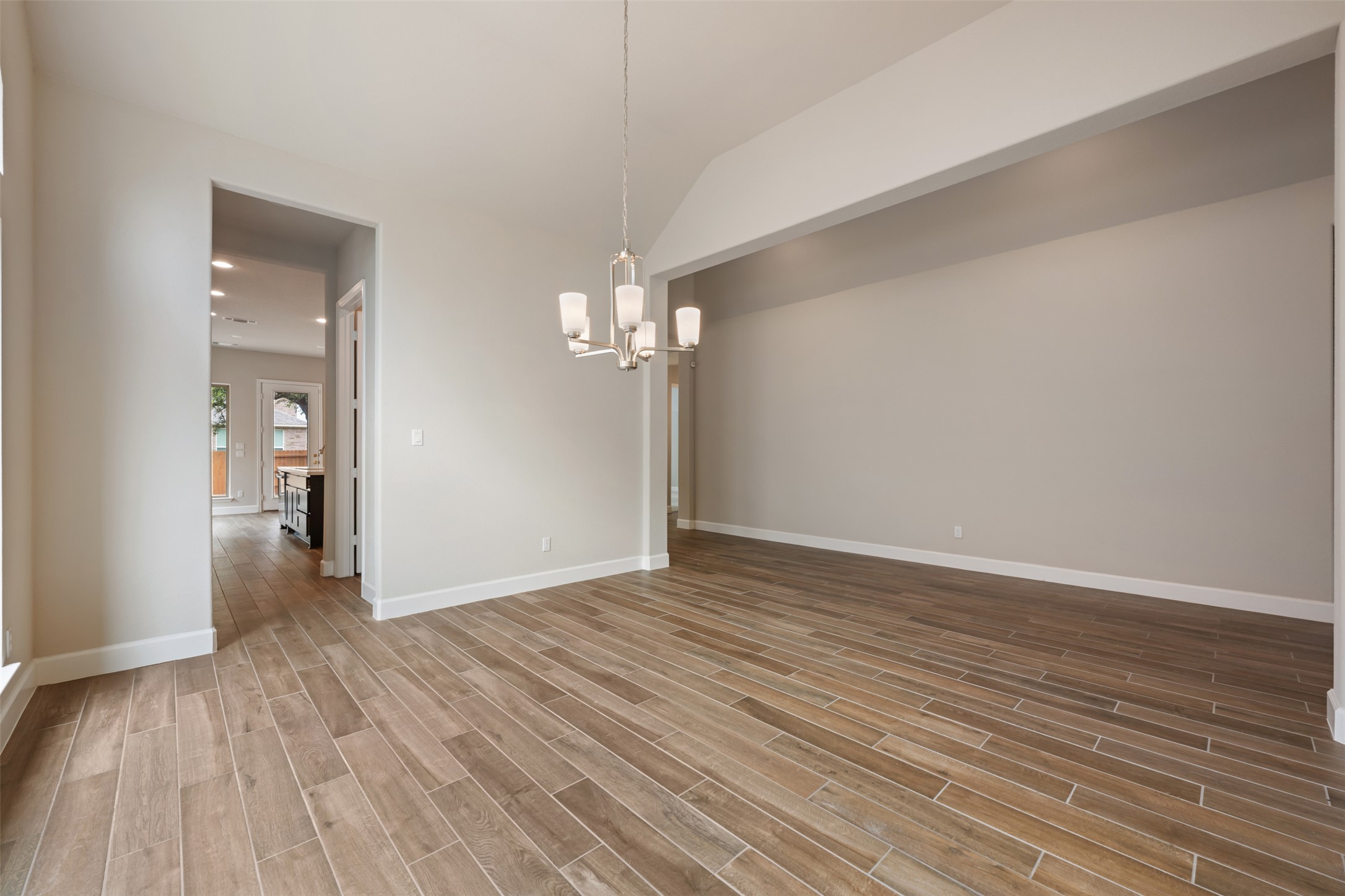 104 Anejo Bluff Georgetown, TX 78628 - Photo 19 of 40 a view of empty room with wooden floor