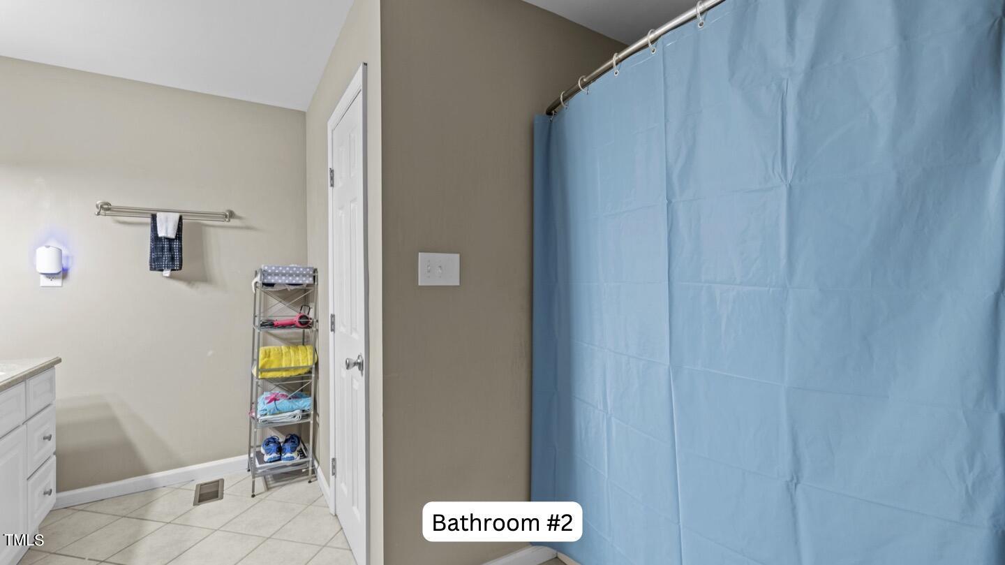 6531 New Market Way Raleigh, NC 27615 - Photo 19 of 27 bathroom