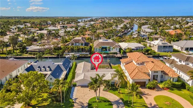 an aerial view of residential building and parking space