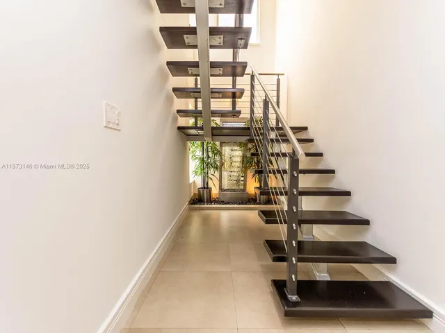 a view of entryway with a front door