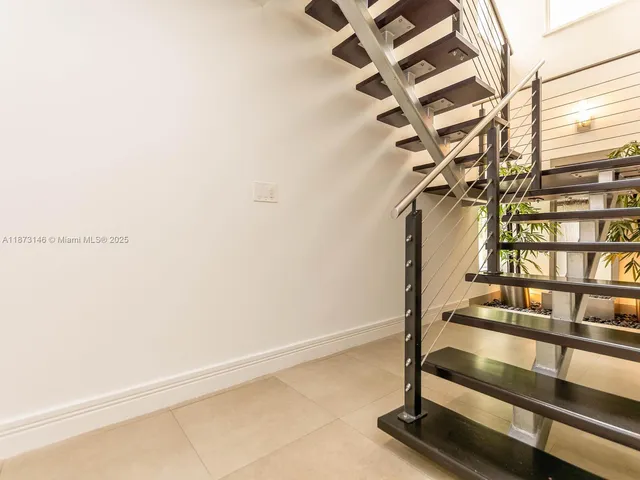 a view of entryway with a front door