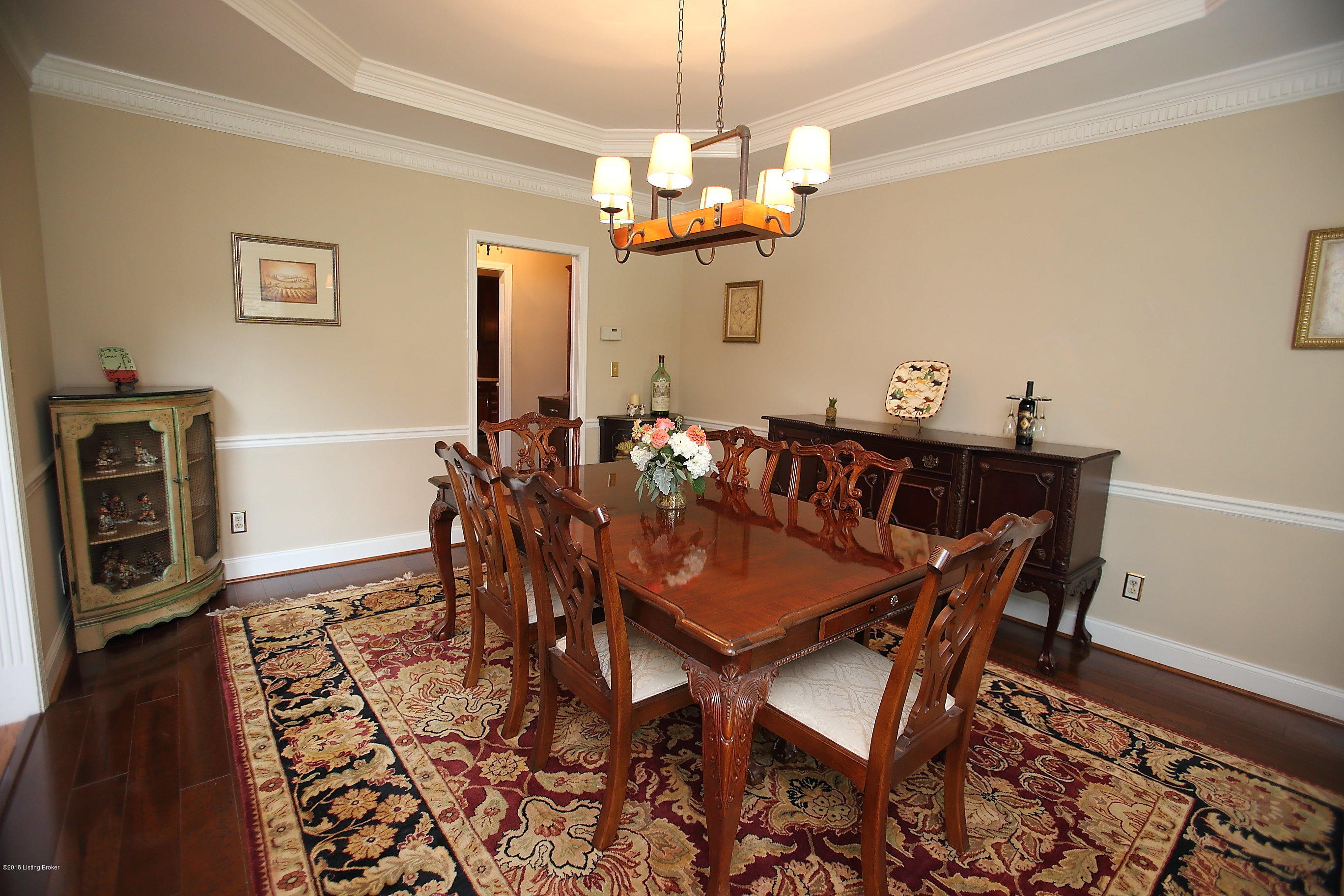 11802 Lakestone Way Prospect, KY 40059 - Photo 13 of 74 Dining room with wood floors and tray ceiling.