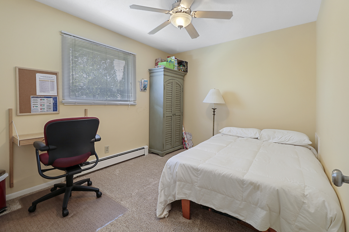 1725 Robert Drive Champaign, IL 61821 - Photo 14 of 18 a bedroom with a bed a desk and chair