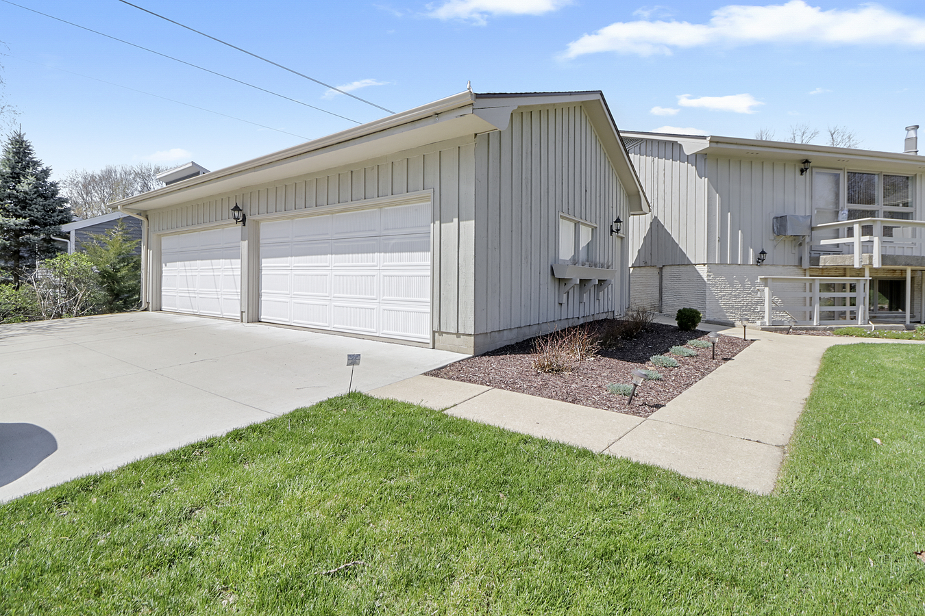 1725 Robert Drive Champaign, IL 61821 - Photo 18 of 18 a front view of a house with garden