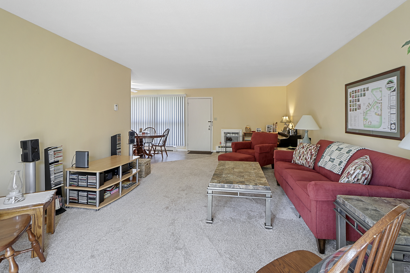 1725 Robert Drive Champaign, IL 61821 - Photo 5 of 18 a living room with furniture and a dining table with wooden floor