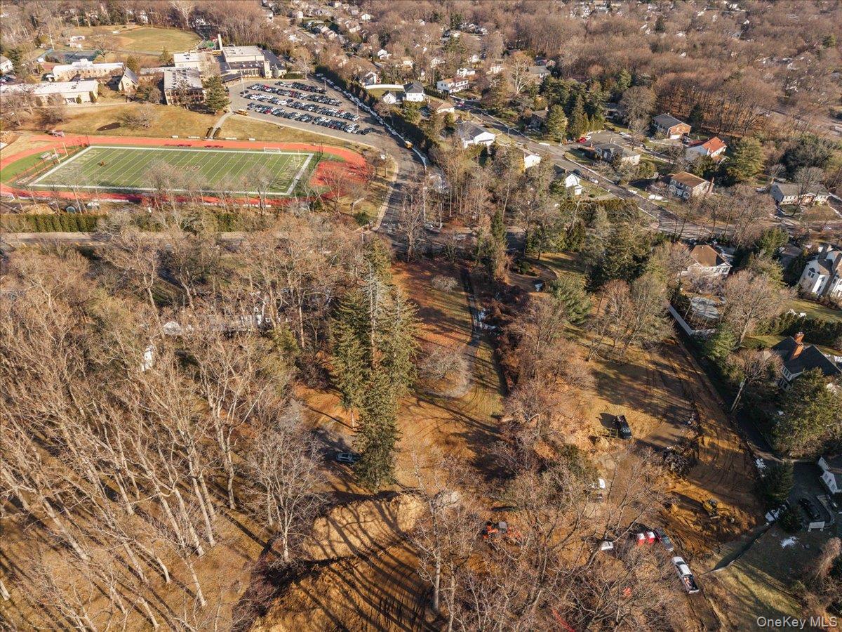 234 Wilmot Road New Rochelle, NY 10804 - Photo 6 of 10 an aerial view of residential houses with outdoor space and trees