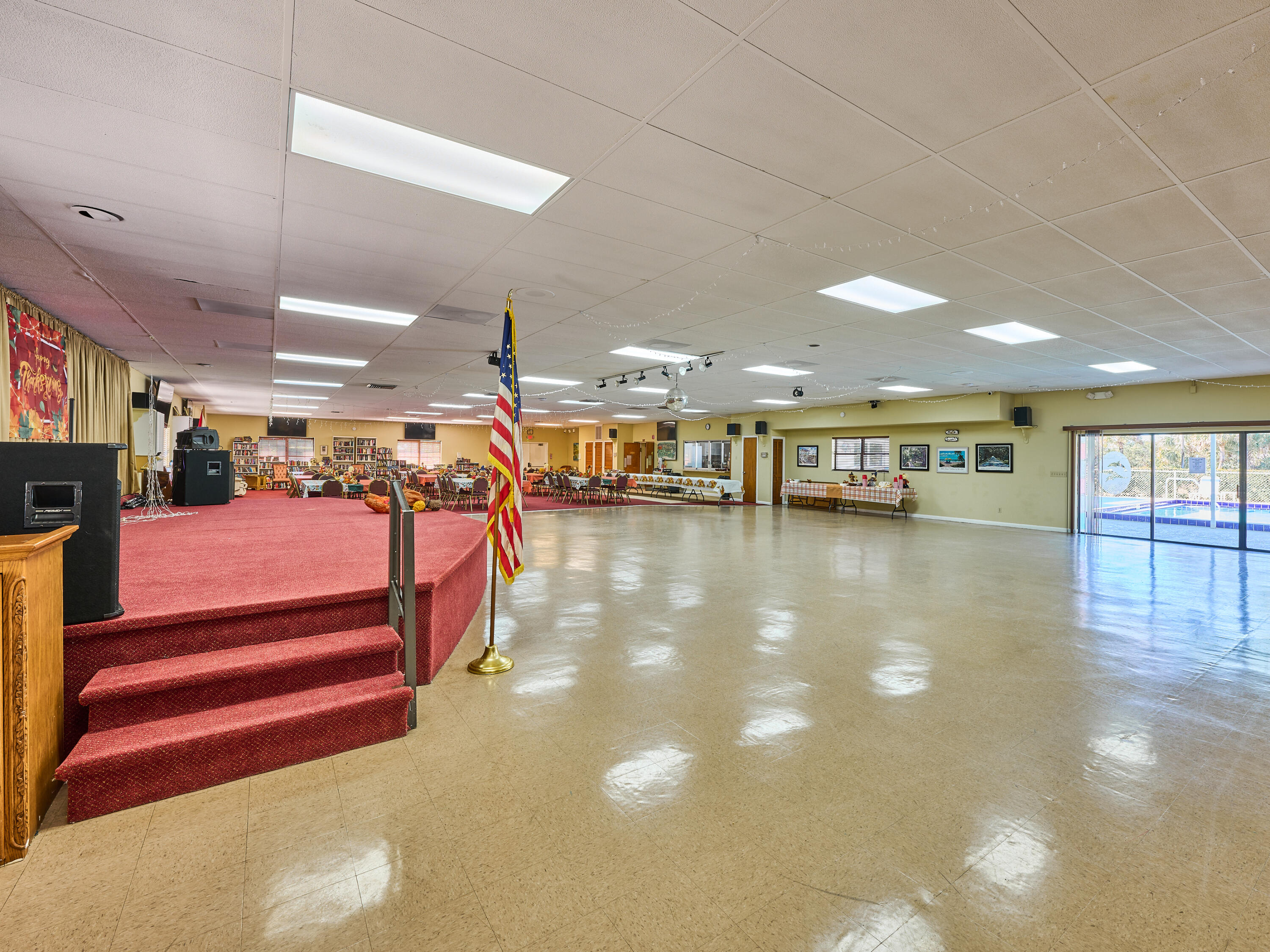 6977 Southeast Delegate Street Hobe Sound, FL 33455 - Photo 54 of 60 a view of a hall with stairs