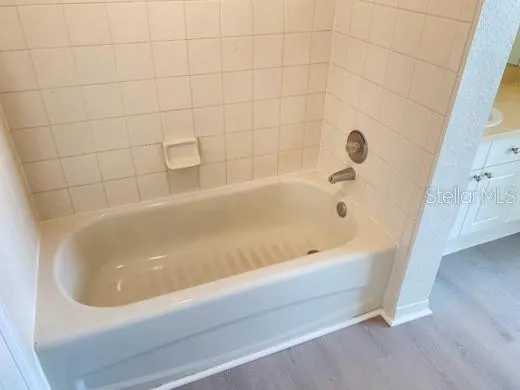 a bathroom with a bathtub