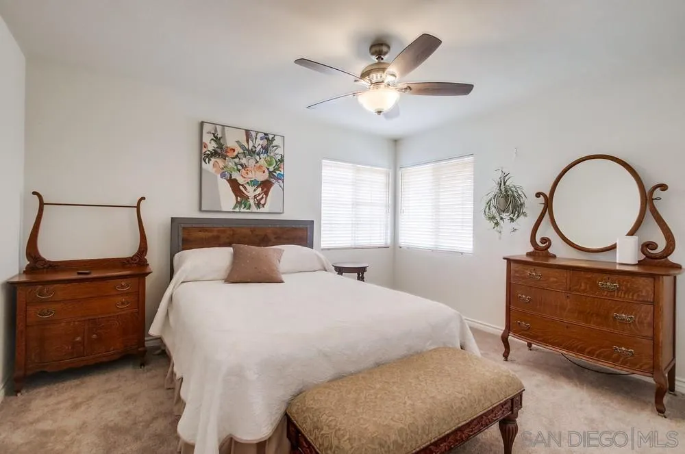 898 Friendly Circle El Cajon, CA 92021 - Photo 27 of 38 a bedroom with a bed and a dresser