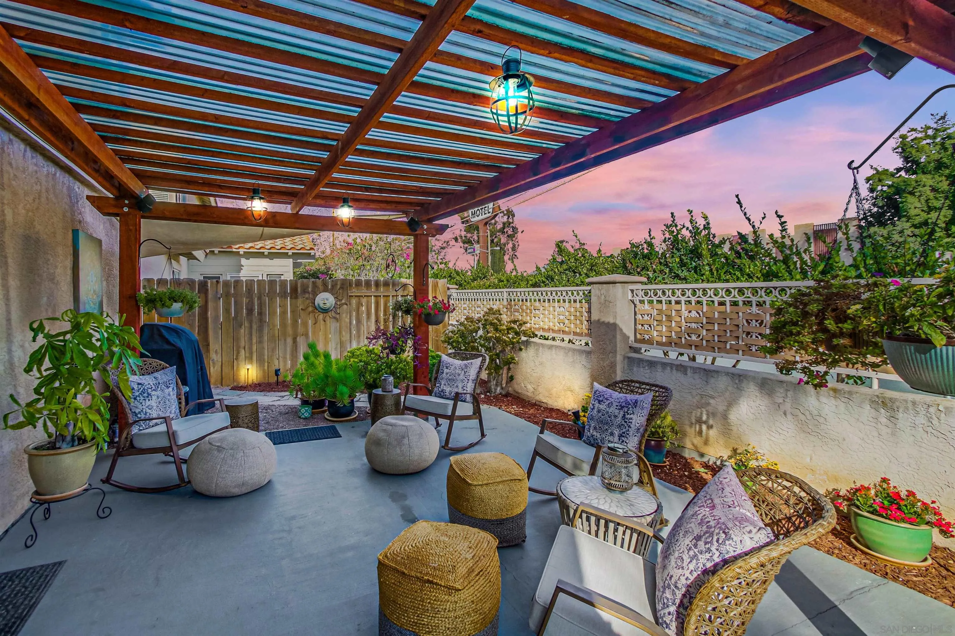 898 Friendly Circle El Cajon, CA 92021 - Photo 32 of 38 a view of a patio with couches chairs and a potted plant