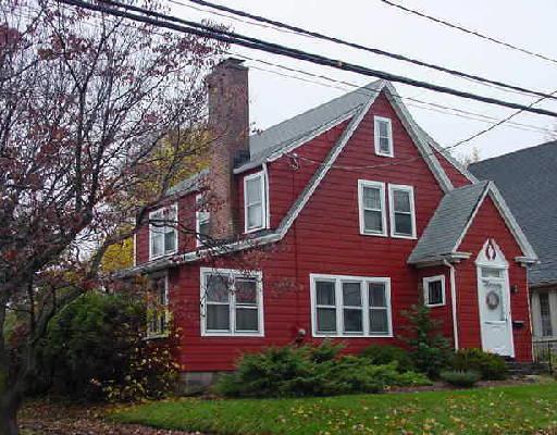 104 Turney Road Fairfield, CT 06824 - Photo 1 of 1 a front view of a house with garden and trees