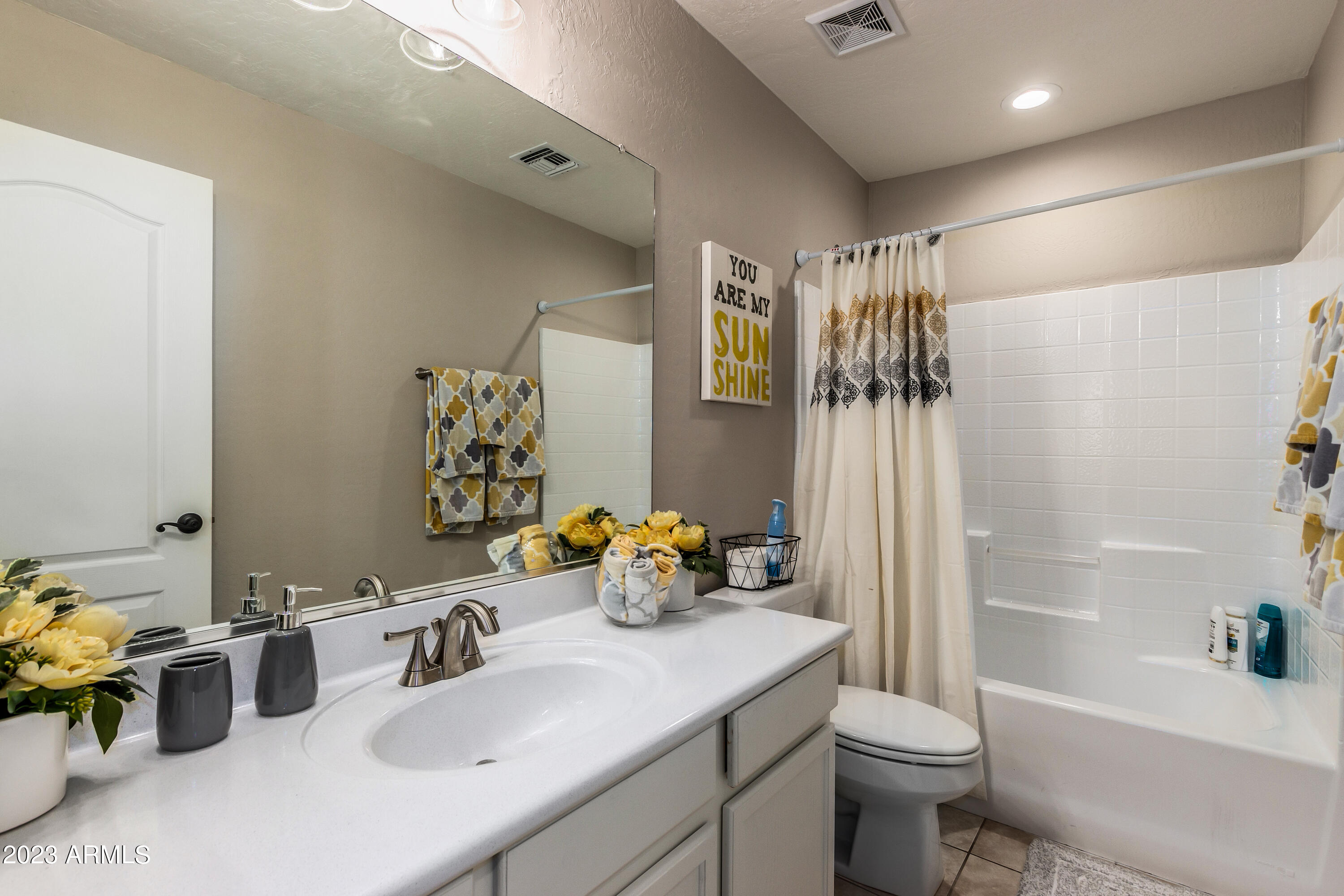 5415 East McKellips Road, Unit 93 Mesa, AZ 85215 - Photo 16 of 64 a bathroom with a sink toilet and shower