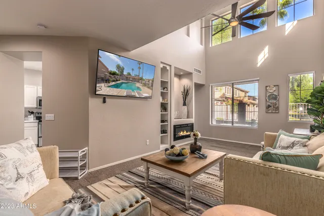 a living room with furniture and a window