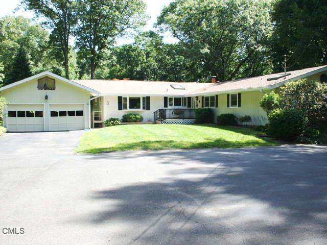 8 Sojo Road Brookfield, CT 06804 - Photo 1 of 1 a view of a white house with a big yard and large trees