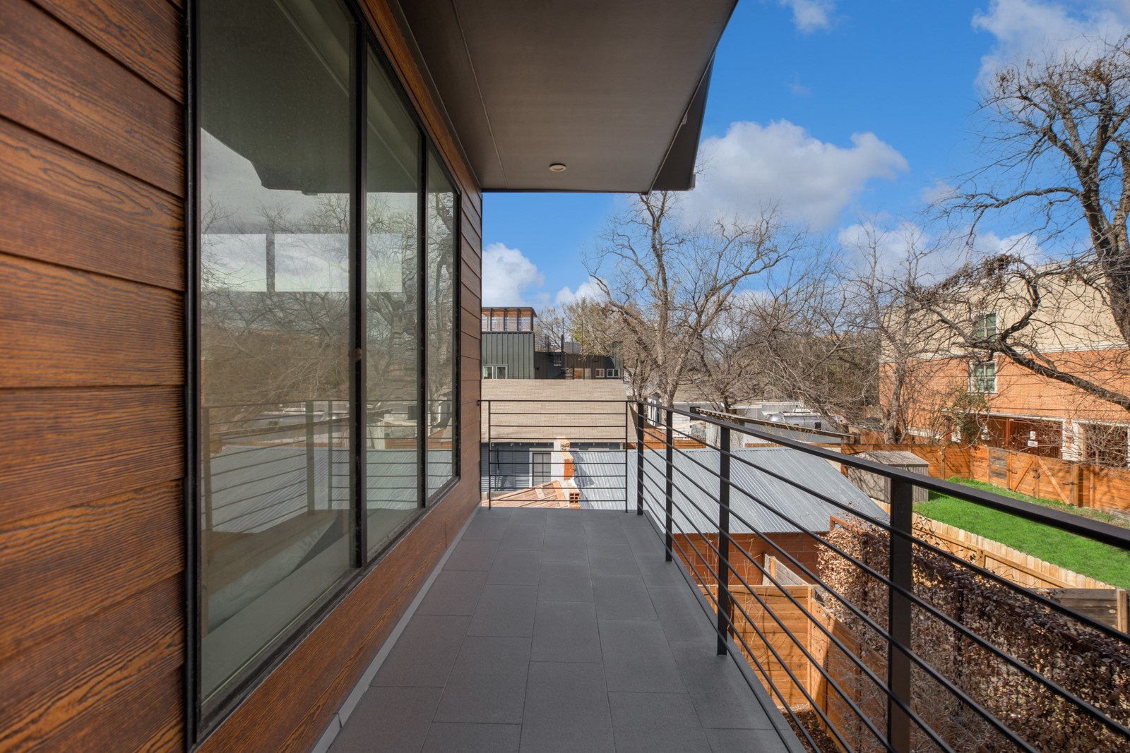 1410 East 3rd Street, Unit A Austin, TX 78702 - Photo 34 of 40 a view of a balcony with a potted plant