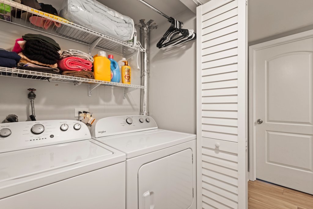 9830 Sayre Avenue, Unit 6 Chicago Ridge, IL 60415 - Photo 14 of 25 a utility room with dryer and washer