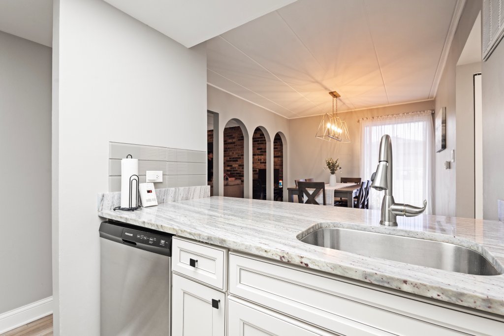 9830 Sayre Avenue, Unit 6 Chicago Ridge, IL 60415 - Photo 10 of 25 a view with granite countertop a sink and a mirror