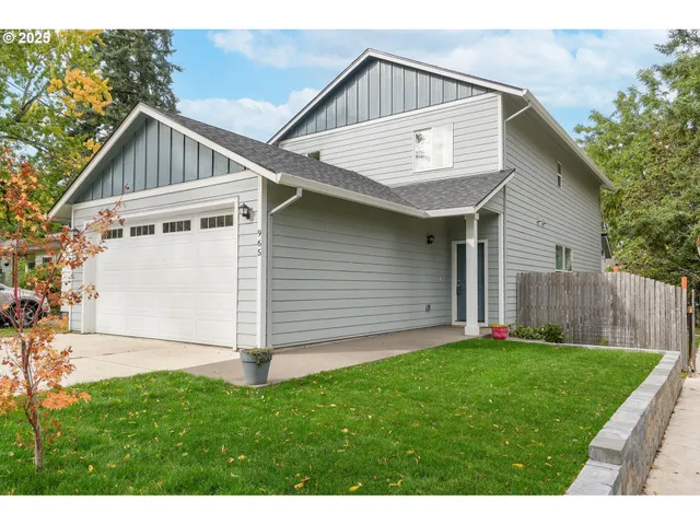 a view of front of house with a yard
