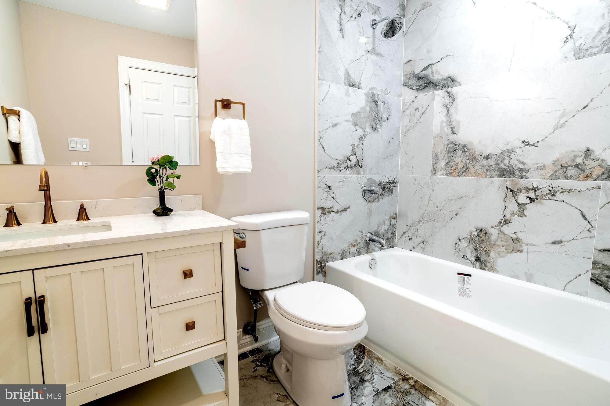 407 Bruce Terrace Cherry Hill, NJ 08034 - Photo 19 of 50 a bathroom with a sink toilet and shower