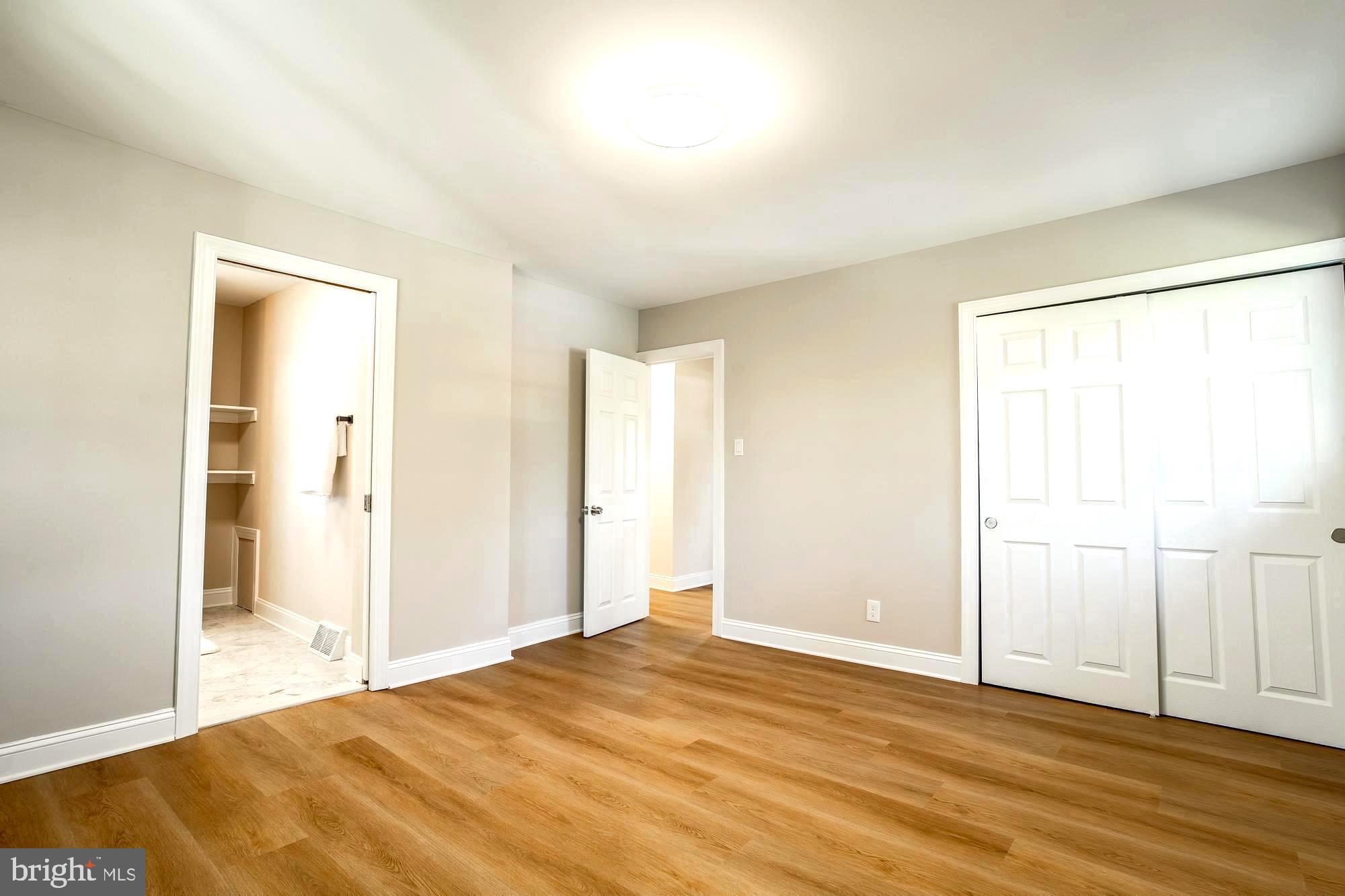 407 Bruce Terrace Cherry Hill, NJ 08034 - Photo 20 of 50 a view of an empty room with wooden floor