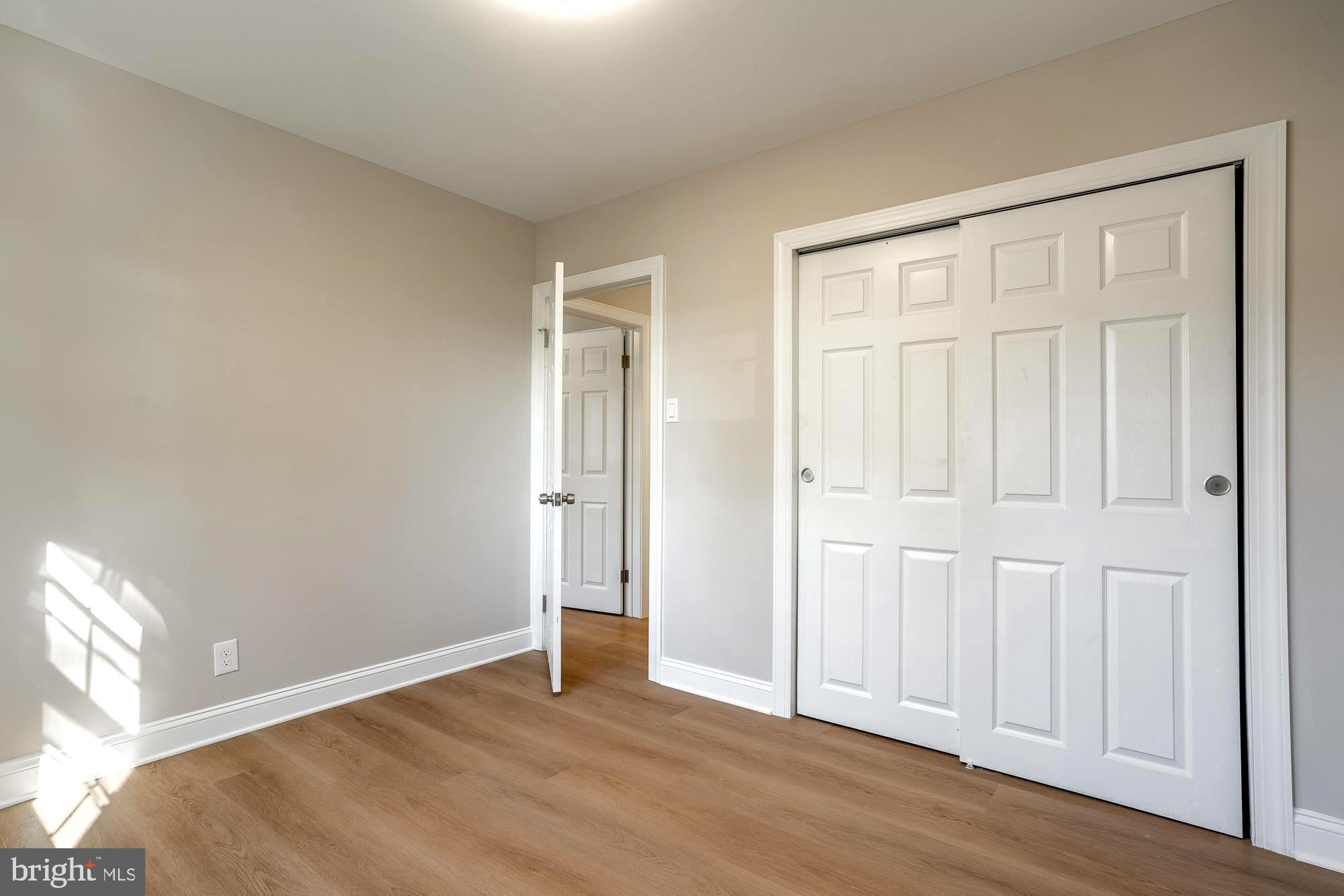 407 Bruce Terrace Cherry Hill, NJ 08034 - Photo 22 of 50 an empty room with wooden floor