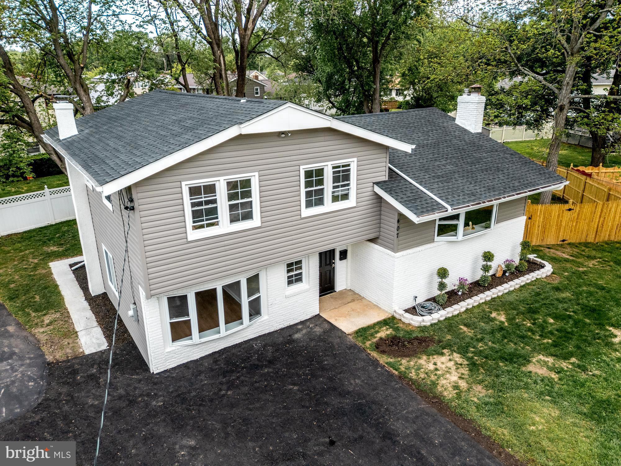 407 Bruce Terrace Cherry Hill, NJ 08034 - Photo 34 of 50 a aerial view of a house with a yard