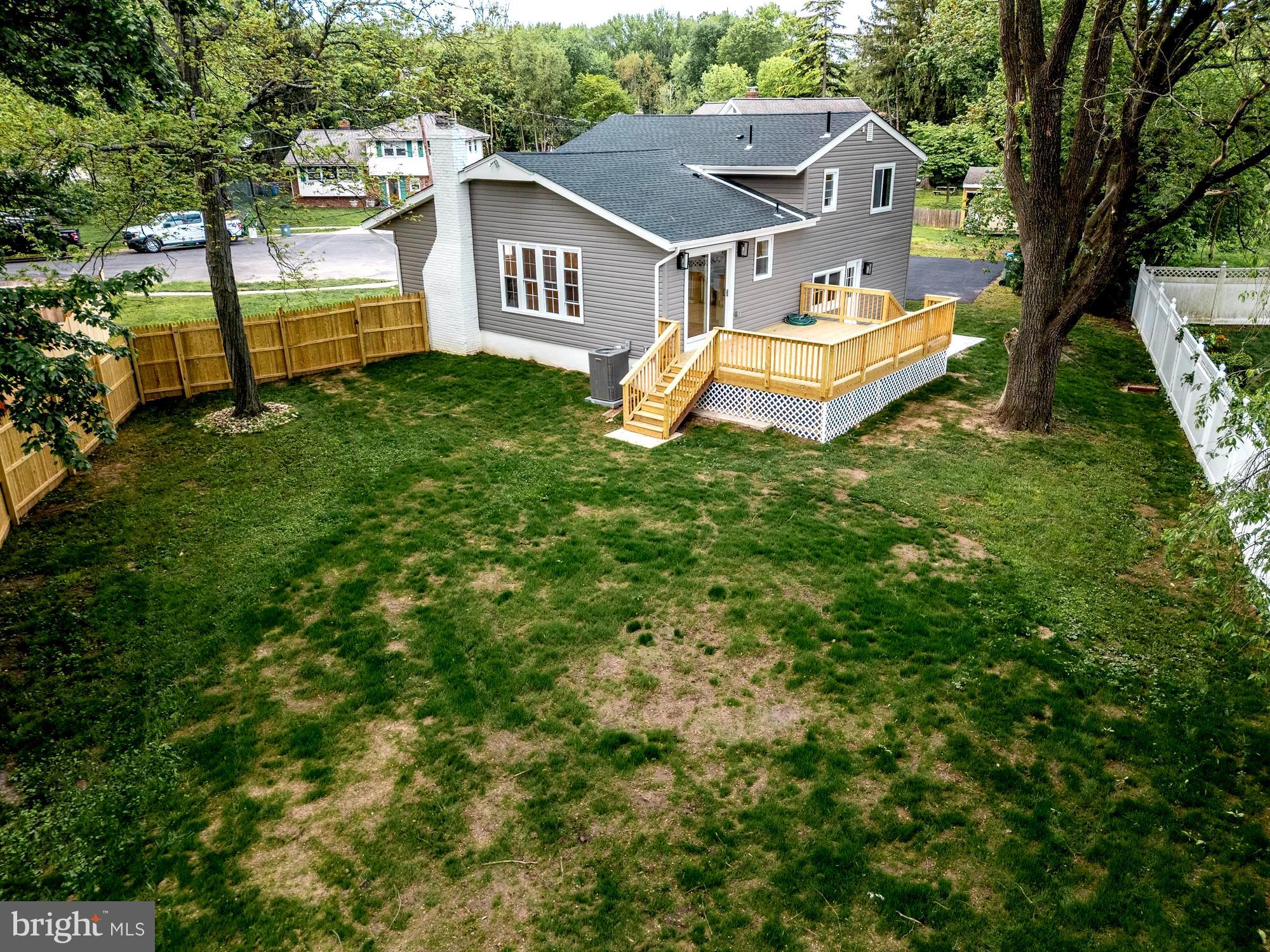 407 Bruce Terrace Cherry Hill, NJ 08034 - Photo 40 of 50 an aerial view of a house with a garden and deck