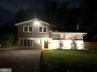 407 Bruce Terrace Cherry Hill, NJ 08034 - Photo 48 of 50 a front view of a house with a yard