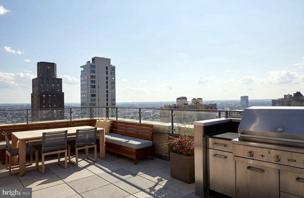 1616 Walnut Street, Unit 1B0703 Philadelphia, PA 19103 - Photo 3 of 8 a terrace view with sitting space